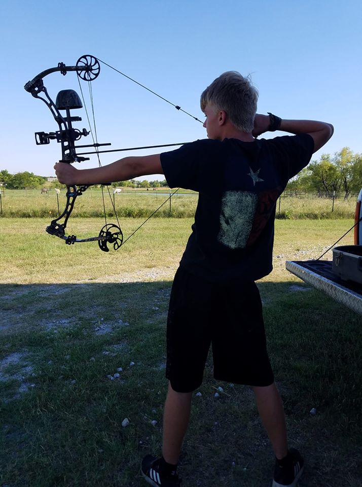 travis shooting my bow.jpg